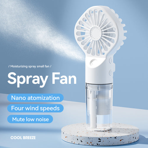 IcyMate handheld mist fan spraying a fine cooling mist